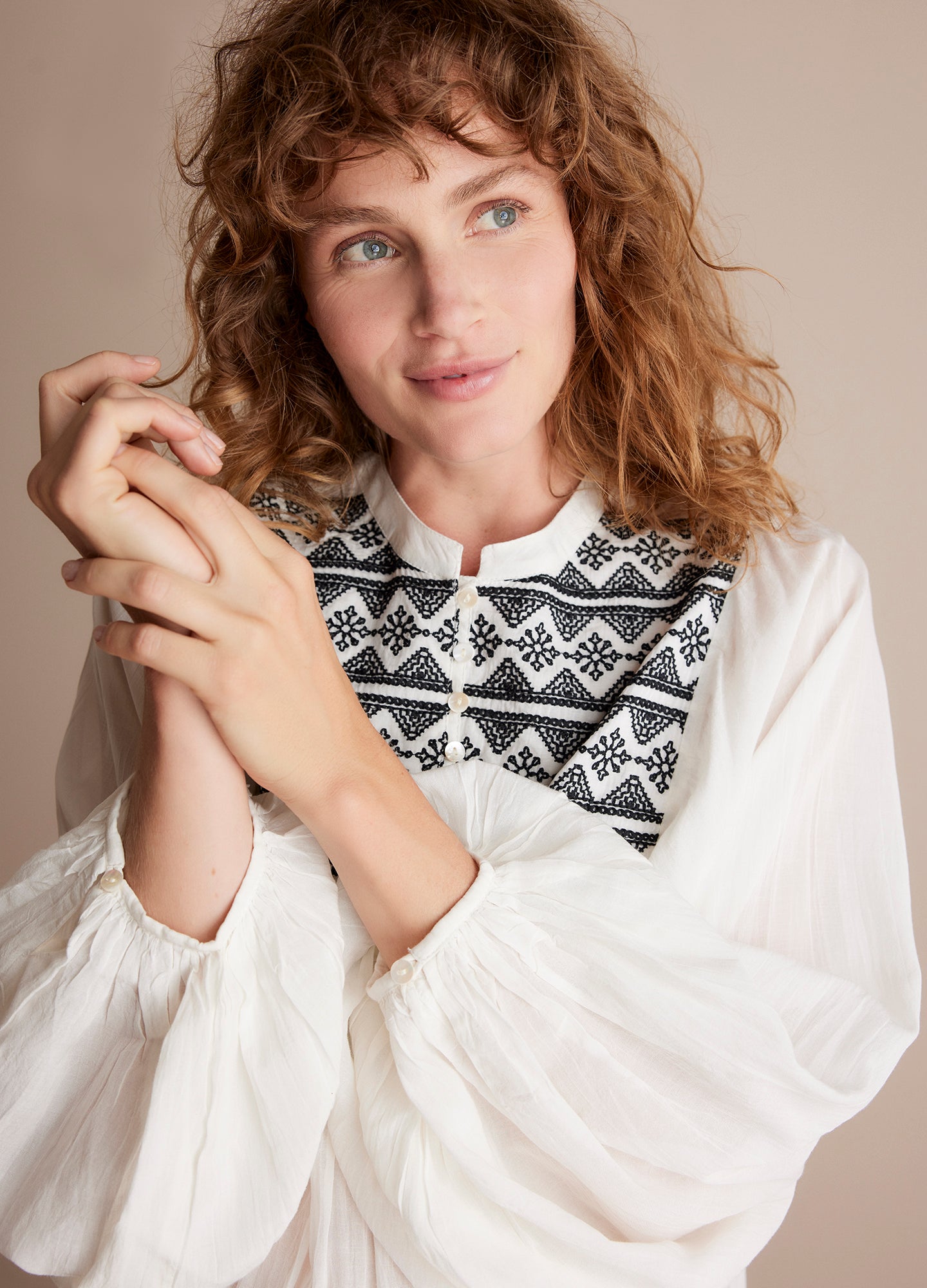 Summum Embroidered White Blouse with a boho-style and balloon sleeves