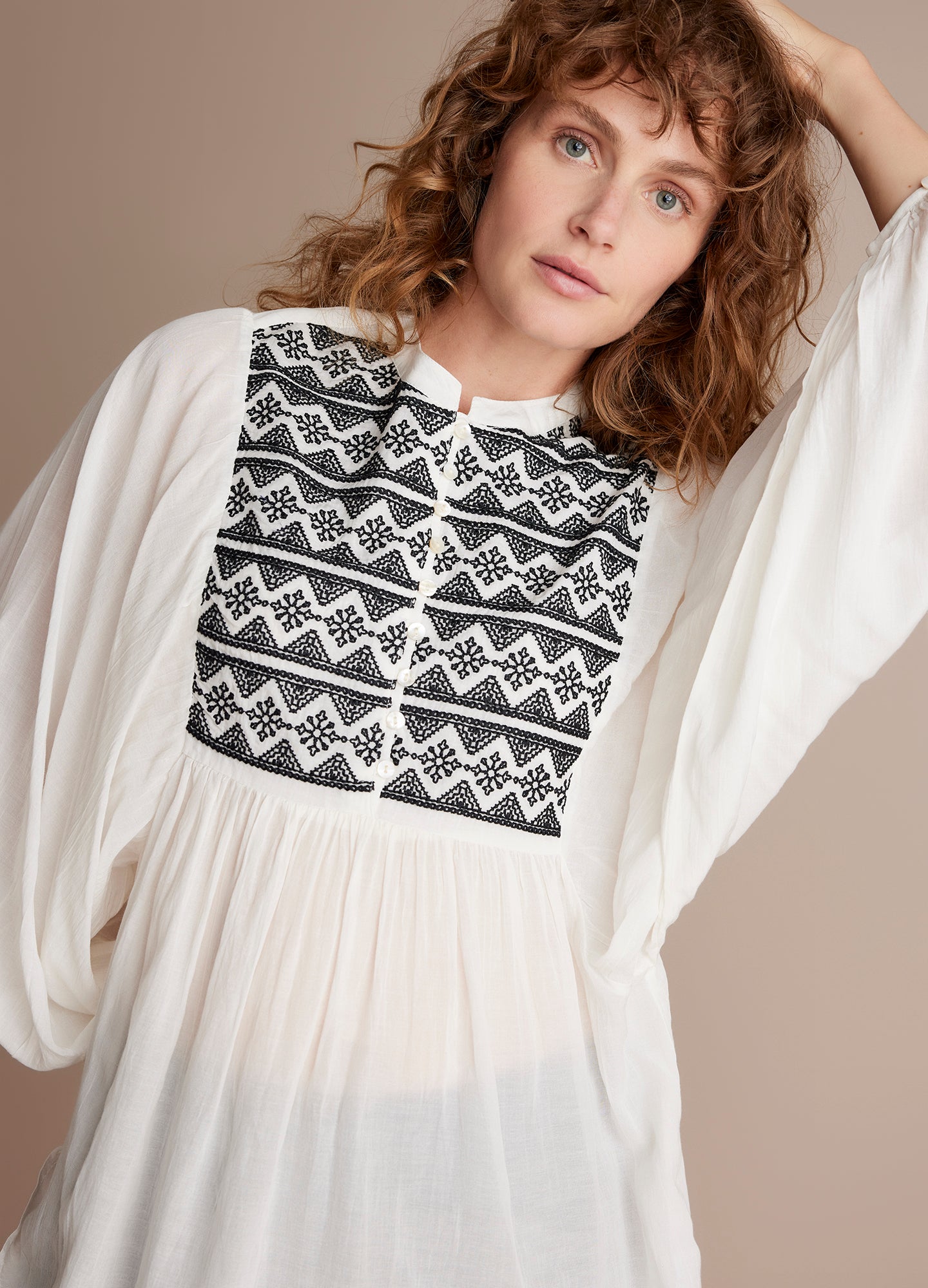 Summum Embroidered White Blouse  with a boho-style and  balloon sleeves